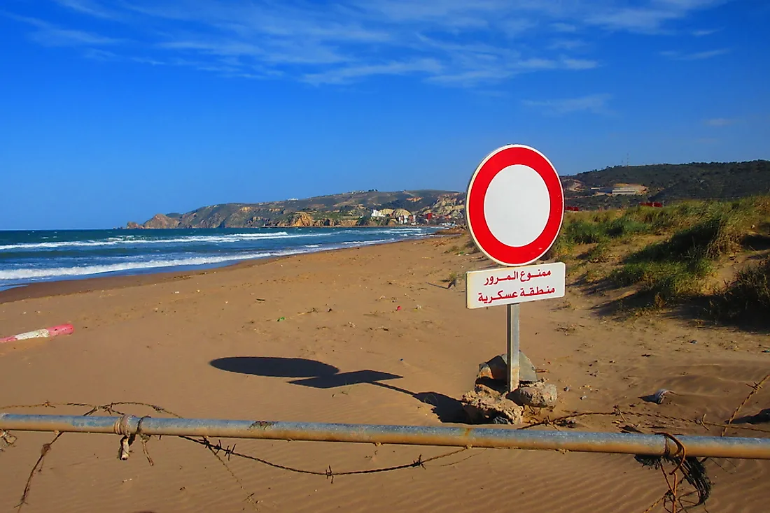 Sign indicating the boundary between Morocco and Algeria.