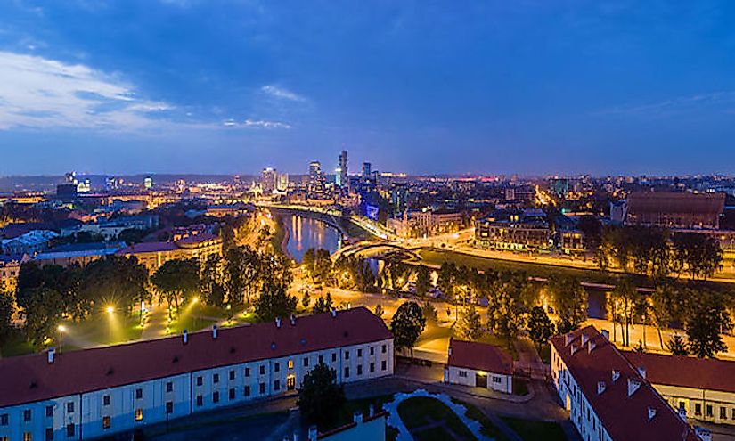 The modern skyline of Vilnius' Financial Centre at night.