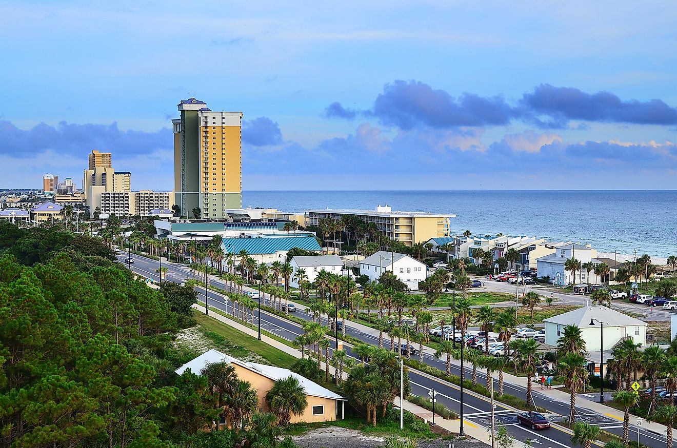 Cityscape image of Panama City Beach, Florida, along Front Beach Road at dusk.