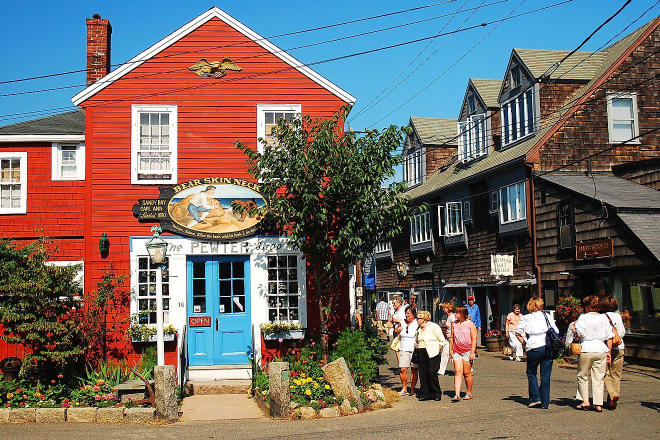 Folks stroll around the unique shops and boutiques on Bearskin Neck in Rockport, Massachusetts