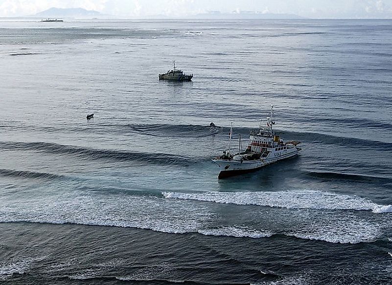 In many island nations in the Caribbean and Pacific, maritime police patrol boats are the closest things to "military" equipment that you will find.