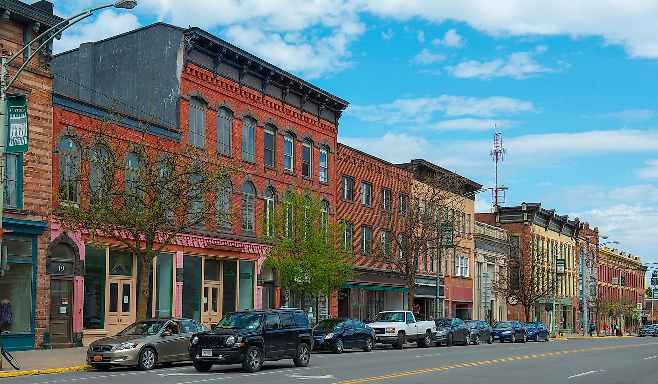 Historic sandstone and brick commercial buildings with Italianate style on Market Street at Main Street in downtown Potsdam, Upstate New York NY, USA. Editorial credit: Wangkun Jia / Shutterstock.com