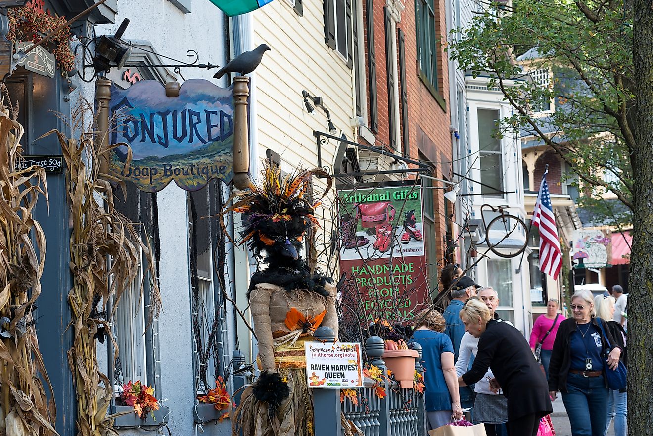 Tourists and storefronts on Broadway Street in downtown Jim Thorpe, Pennsylvania, via aimintang / iStock.com