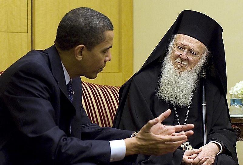 Bartholomew I, the current Archbishop and Patriarch of Constantinople, sitting and talking with U.S. President Barack Obama.