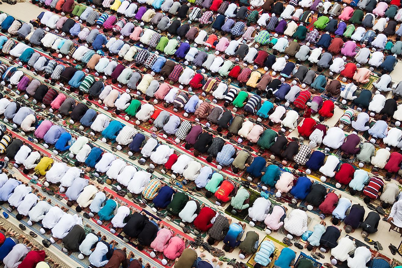 Muslims praying peacefully in Bangladesh during Friday prayer. Image credit: Insight Photography/Shutterstock.com