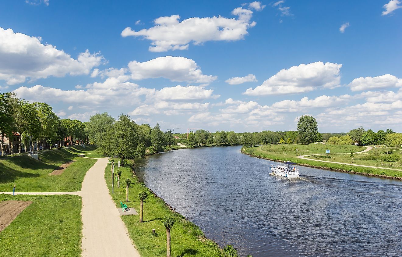 Bicycle path along the river Ems in Haren, Germany.