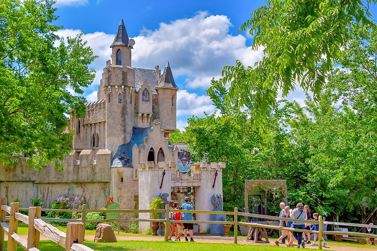 People visiting the enchanting fairytale castle in Waxahachie during the Scarborough Renaissance Festival. Editorial credit: Grossinger / Shutterstock.com