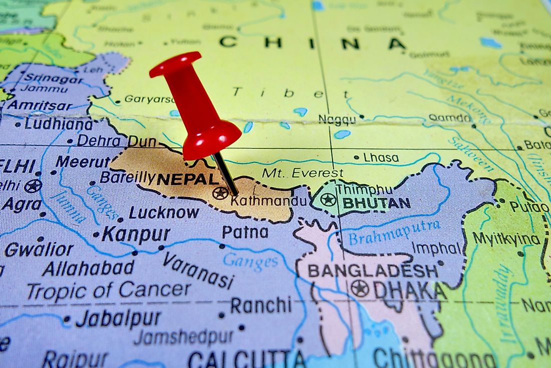 Nepal borders China to the north and India to the east, south, and west.