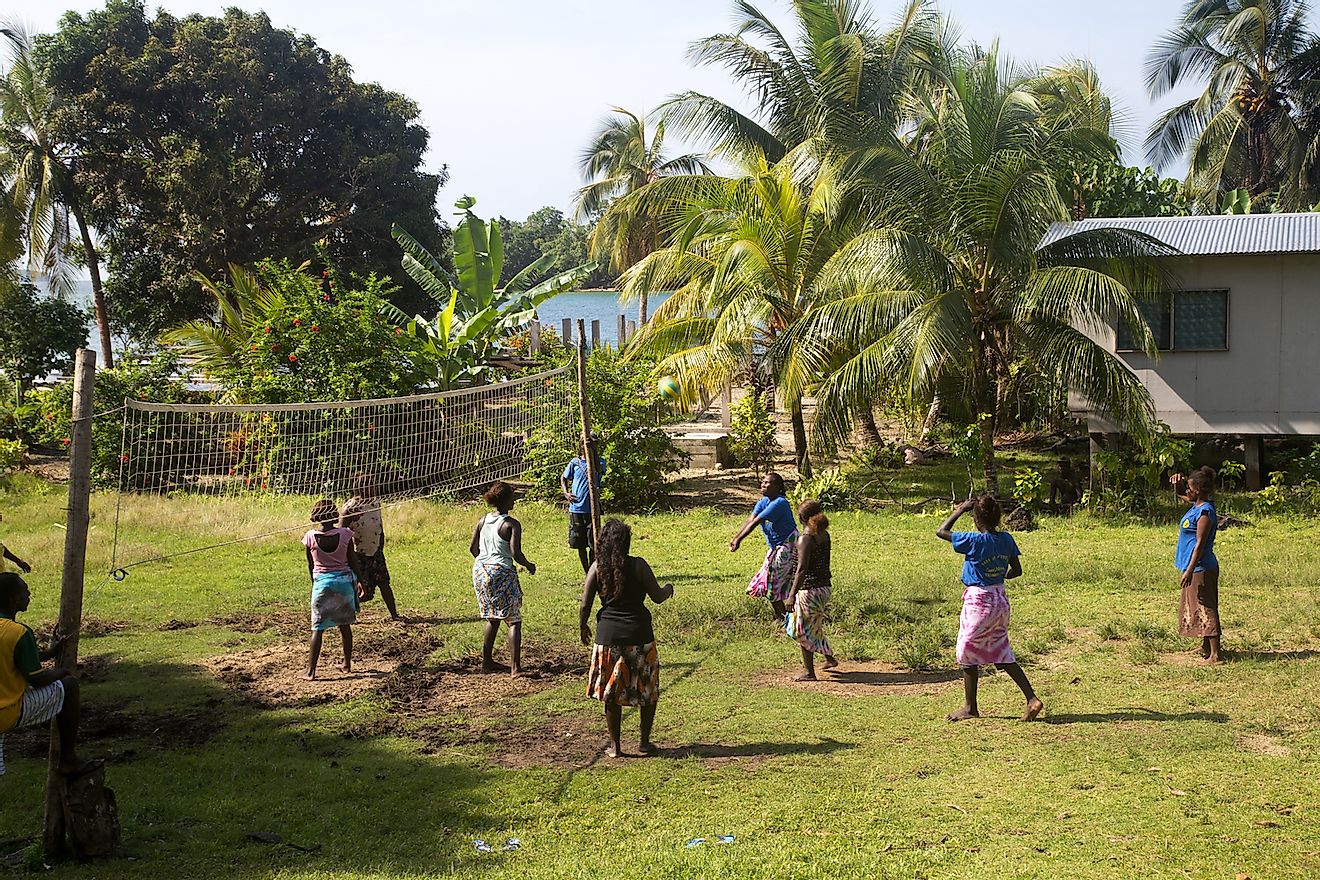 Women and girls playing volleyball in Chea village in Marovo Lagoon, Solomon Island. Image credit: Oliver Foerstner/Shutterstock.com