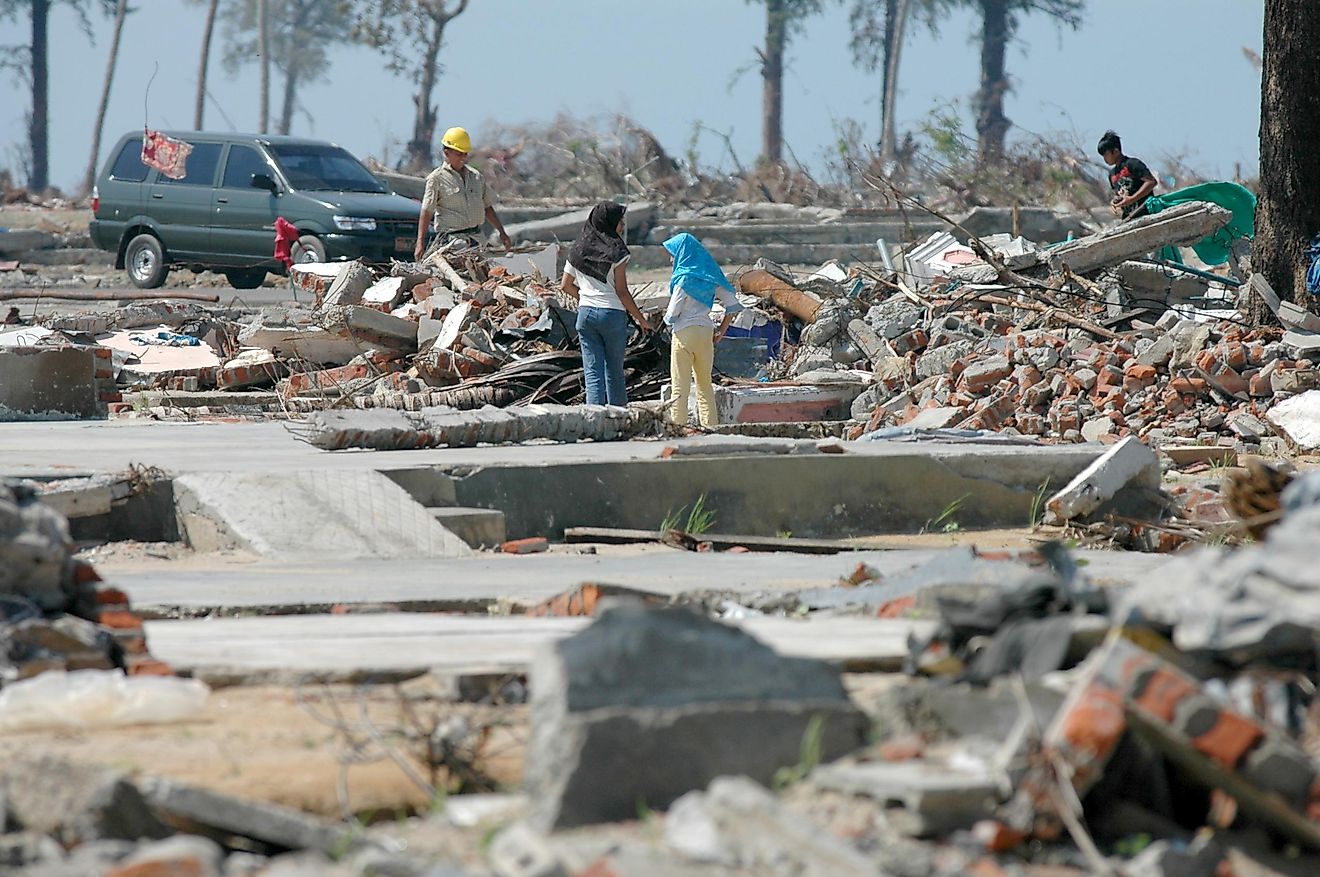 Kids play at their Demaged house. Indian Ocean Earthquake and Tsunami disaster Destroyed Aceh in December 26 2004