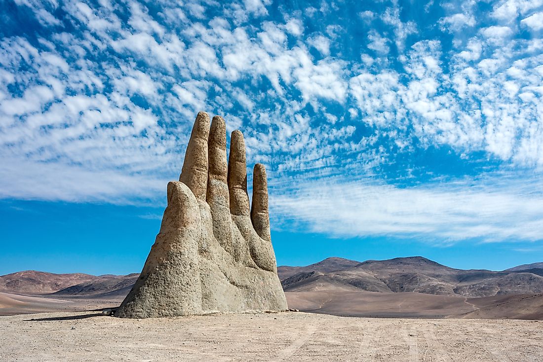 The hand in the desert outside of Antofagasta, Chile. Editorial credit: Ksenia Ragozina / Shutterstock.com. 