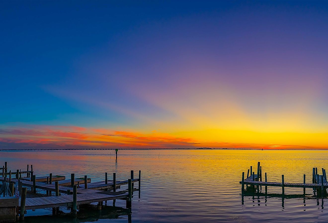 Sunset over Laguna Madre, South Padre Island TX. Image credit Greg via Adobe Stock.