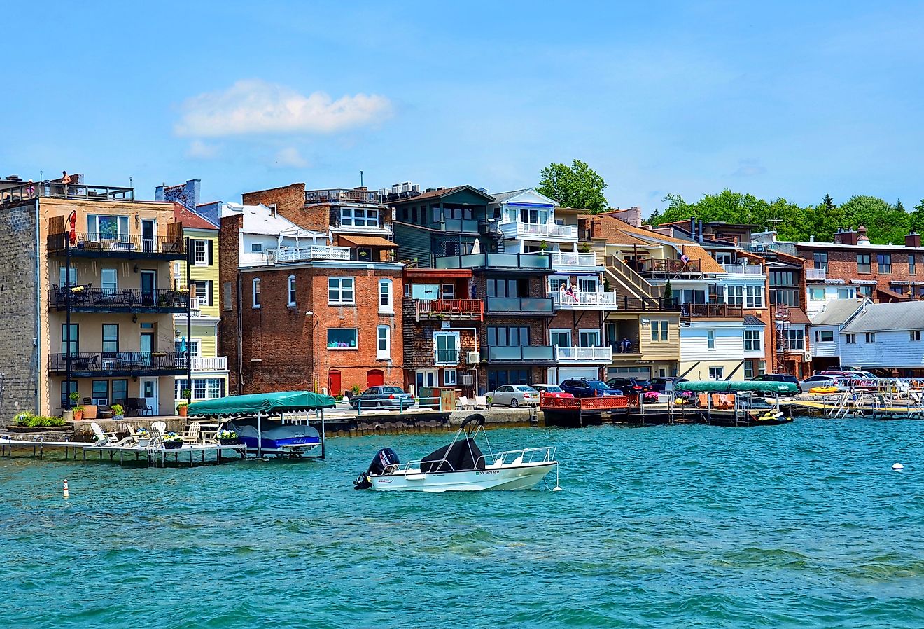 Shops and restaurants on Skaneateles Lake in upstate New York, view from the pier. Image credit PQK via Shutterstock.com