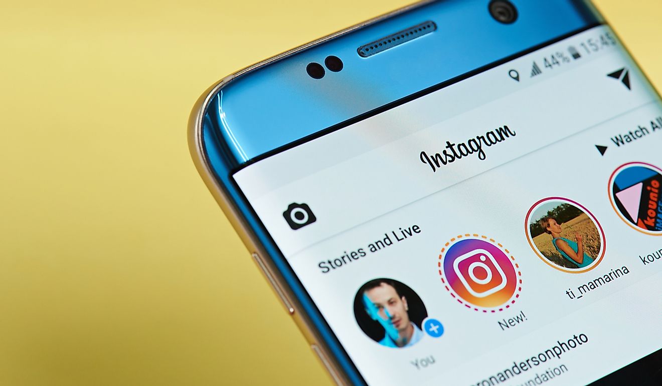 Instagram application menu on smartphone screen. Editorial credit: PixieMe / Shutterstock.com.