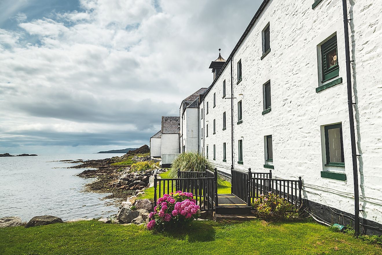 Laphroaig distillery buildings on the Scottish shore. Image credit: Volodymyr Goinyk/Shutterstock.com