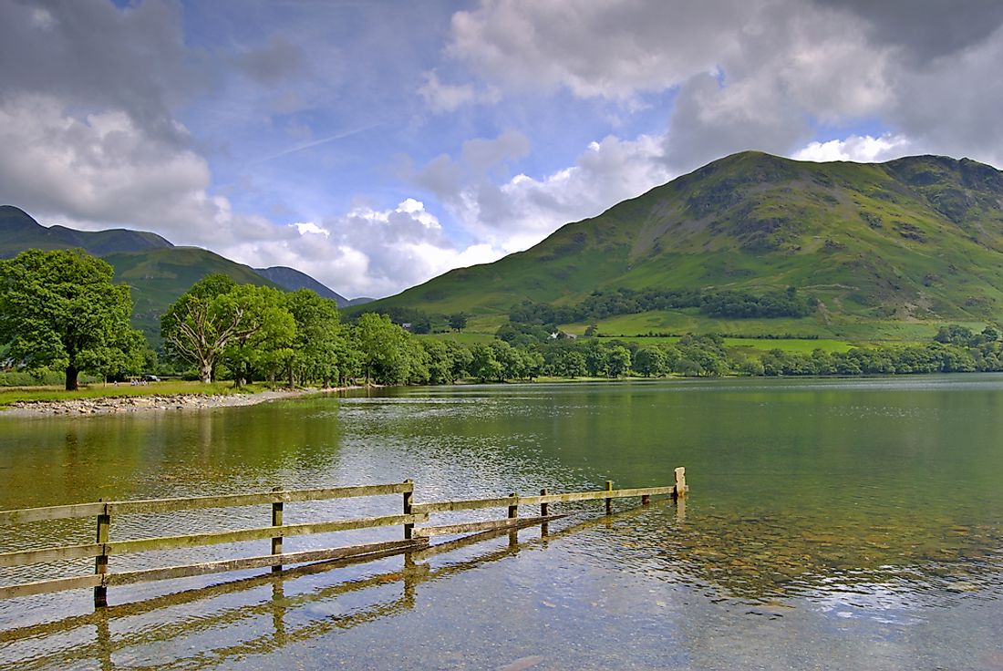 A fence is seen partially submerged in the Lake District of England. The island of Great Britain is susceptible to the adverse effects of rising sea levels. 