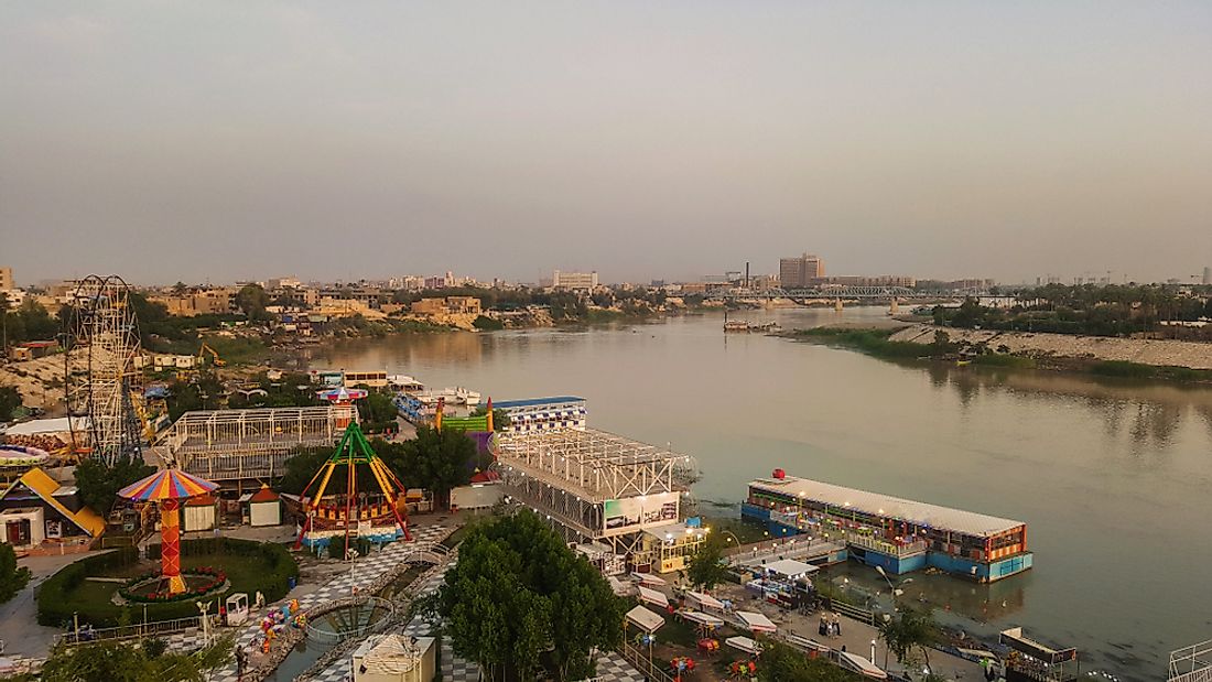 The city of Baghdad is located on a massive plain bisected by the Tigris River. 