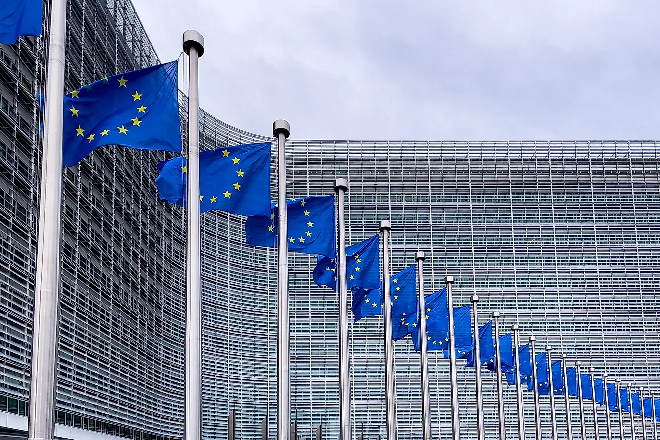 European Union flags in front of the European Commission headquarters in Brussels, Belgium. Editorial credit: Mounir Taha / Shutterstock.com