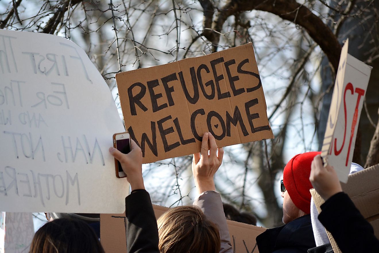 People participating in the protest march against President Trump's new immigration laws in Manhattan in 2017 in New York City. Image credit: Christopher Penler/Shutterstock.com