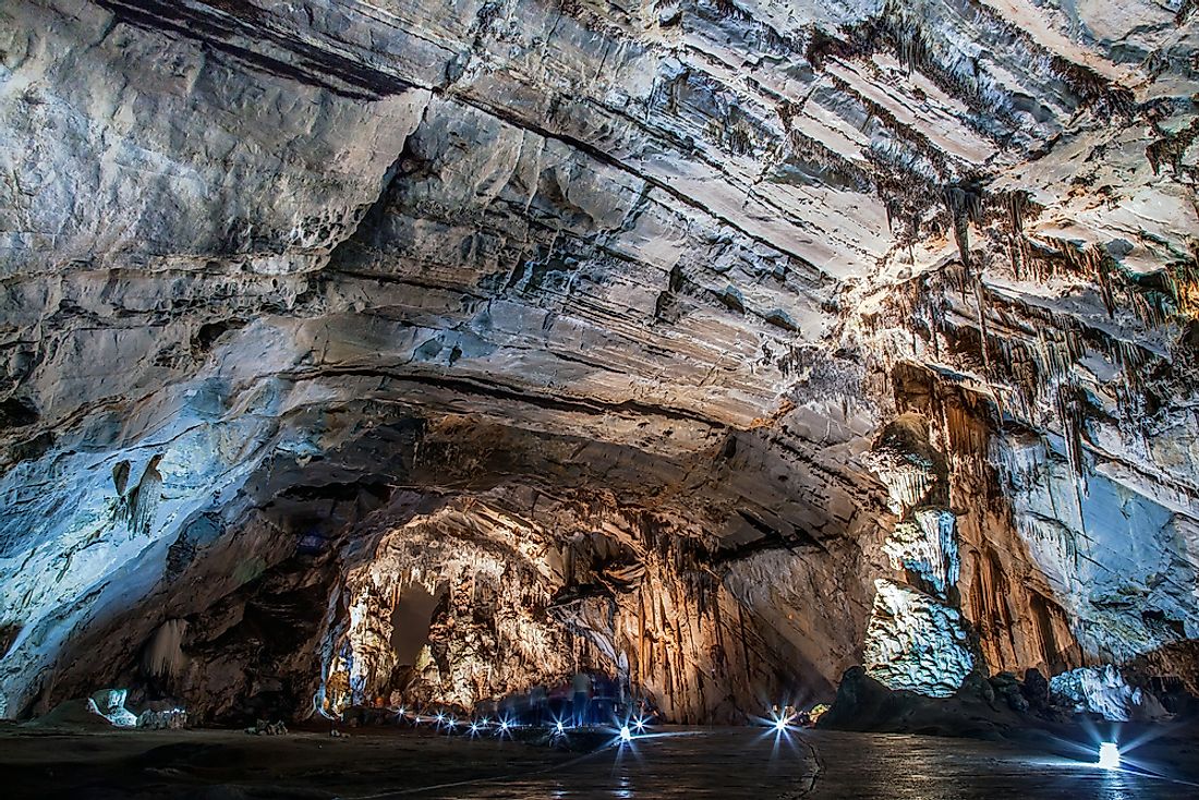 A lit walkway and stalagmites in the caverns at Mexico's Grutas de Cacahuamilpa National Park.