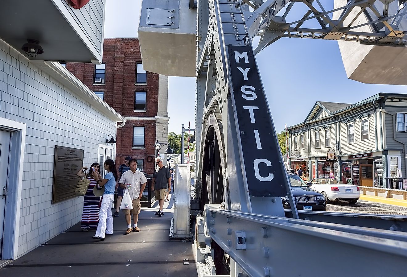 The Mystic Connecticut bridge spans the Mystic River, it carries foot traffic to the tourist district of town. Image credit Paul Latham via Shutterstock