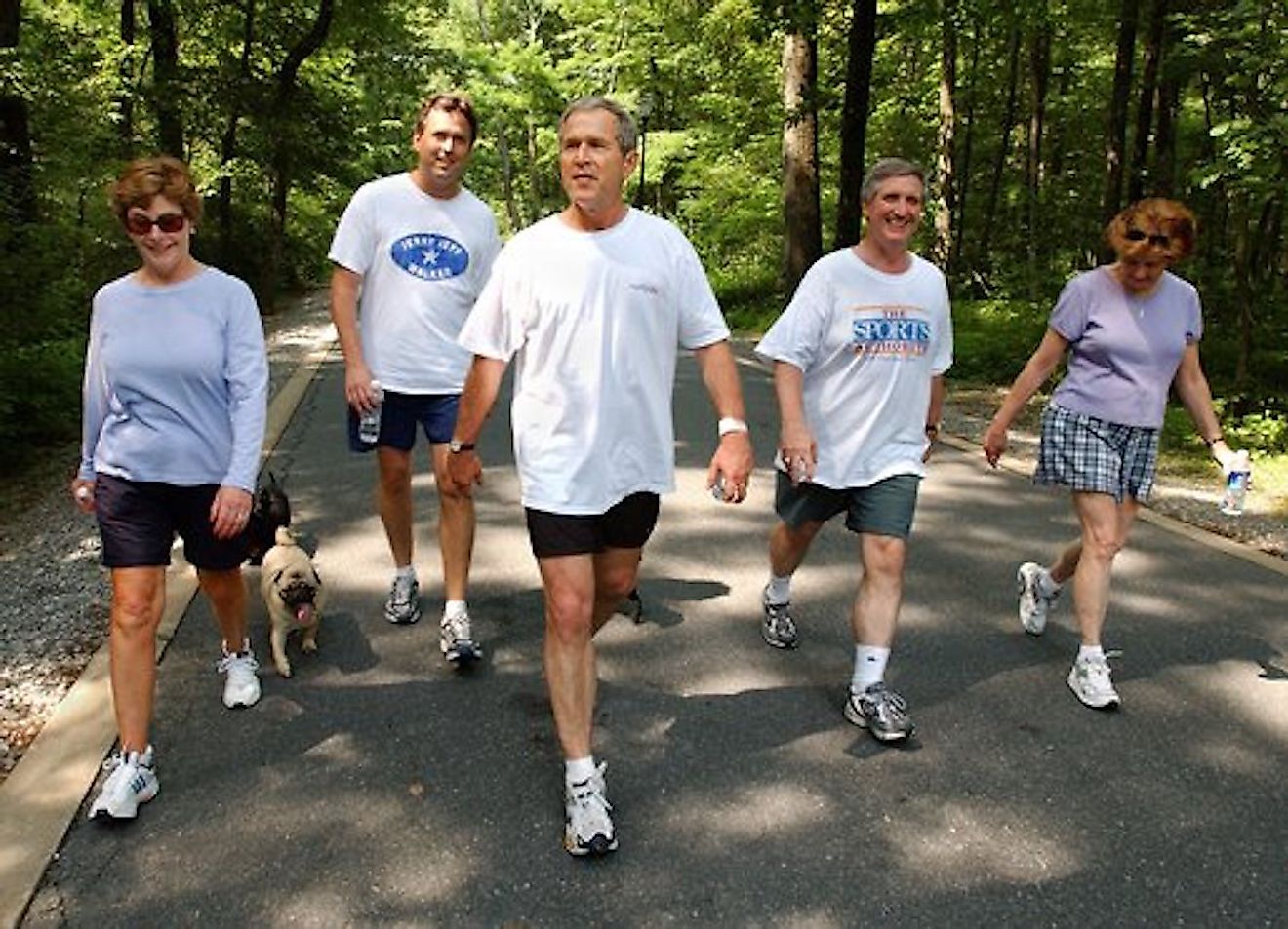 President George W. Bush and First Lady Laura Bush complete a four mile walk. Image credit: White House photo by Eric Draper.