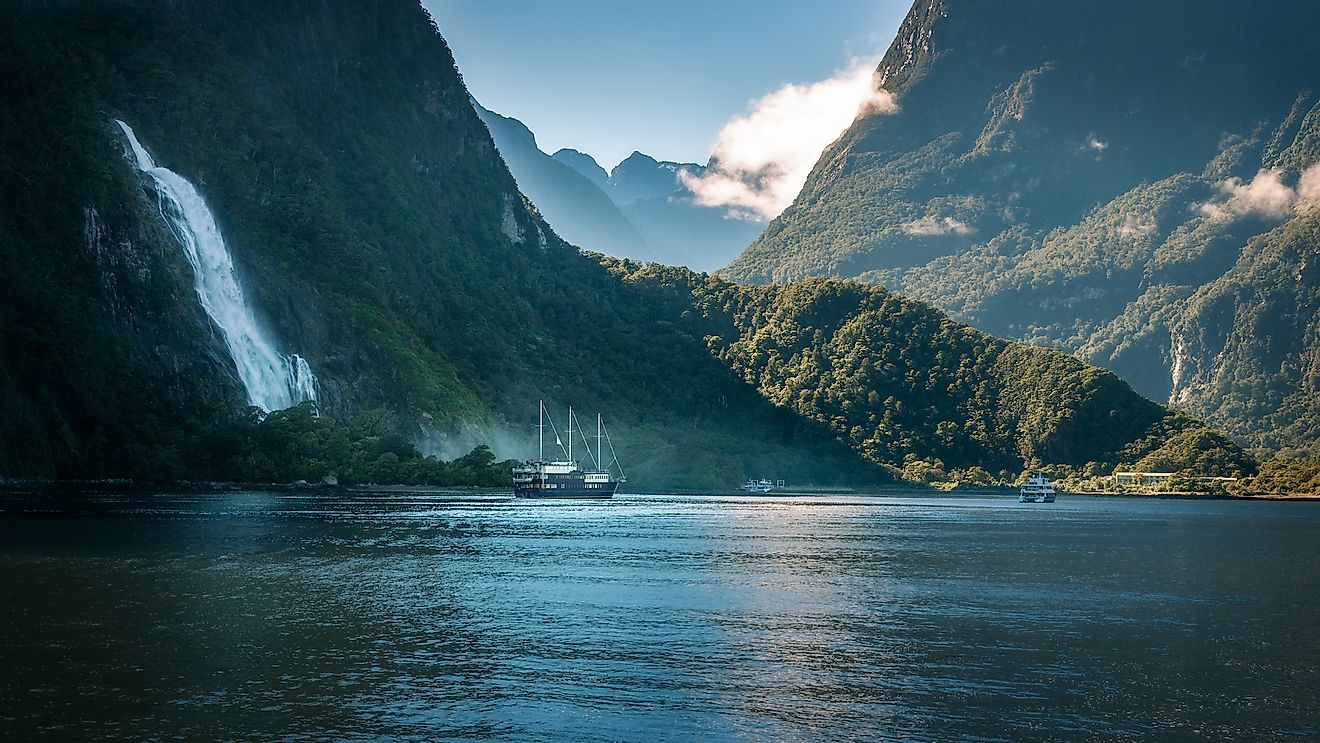 The powerful Bowen Falls on a beautiful summer morning at Milford Sound in Fiordland National Park, New Zealand, South Island. Image credit: Daniela Constantinescu/Shutterstock.com
