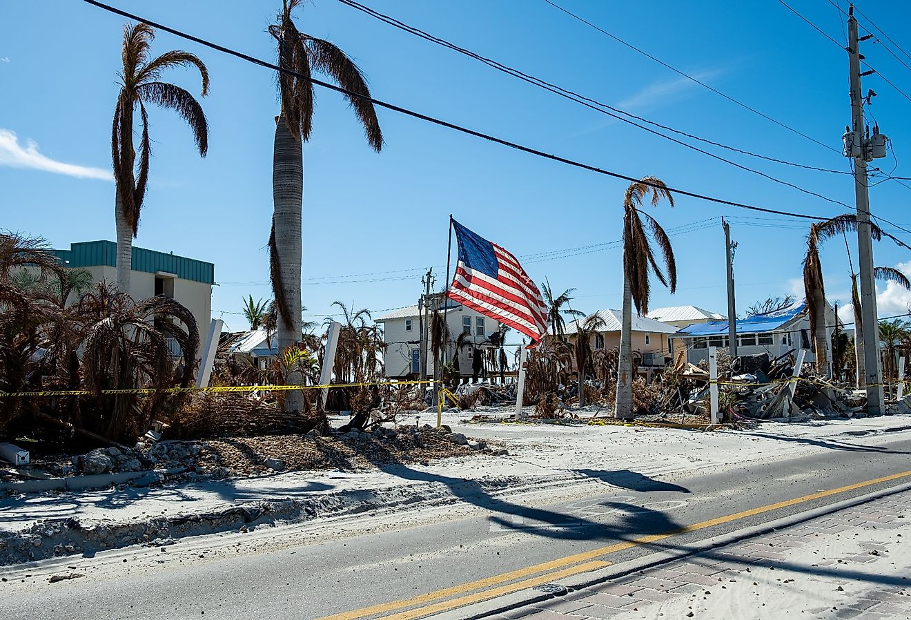 Fort Myers Beach, Florida, October 26, 2022: An American flag along Estero Blvd after Hurricane Ian. Image credit Jeff McCollough via Shutterstock