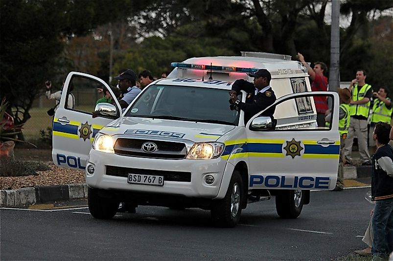 Police in Cape Town, South Africa block the road to deal with a public disturbance on the city's streets.