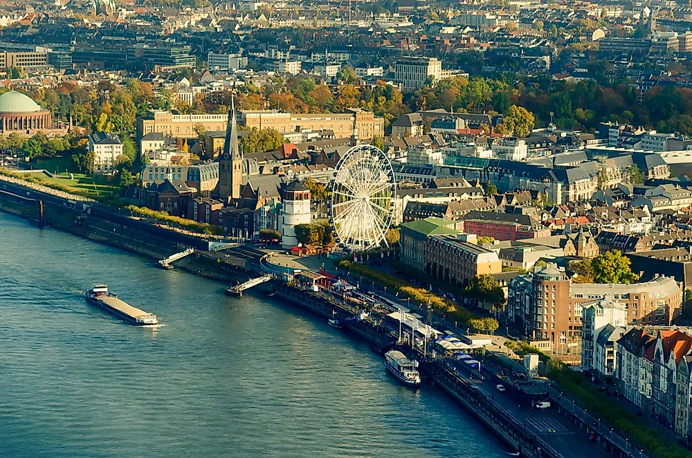 Dusseldorf, Germany. Dusseldorf is part of a larger urbanized area of Europe known as the "Blue Banana".