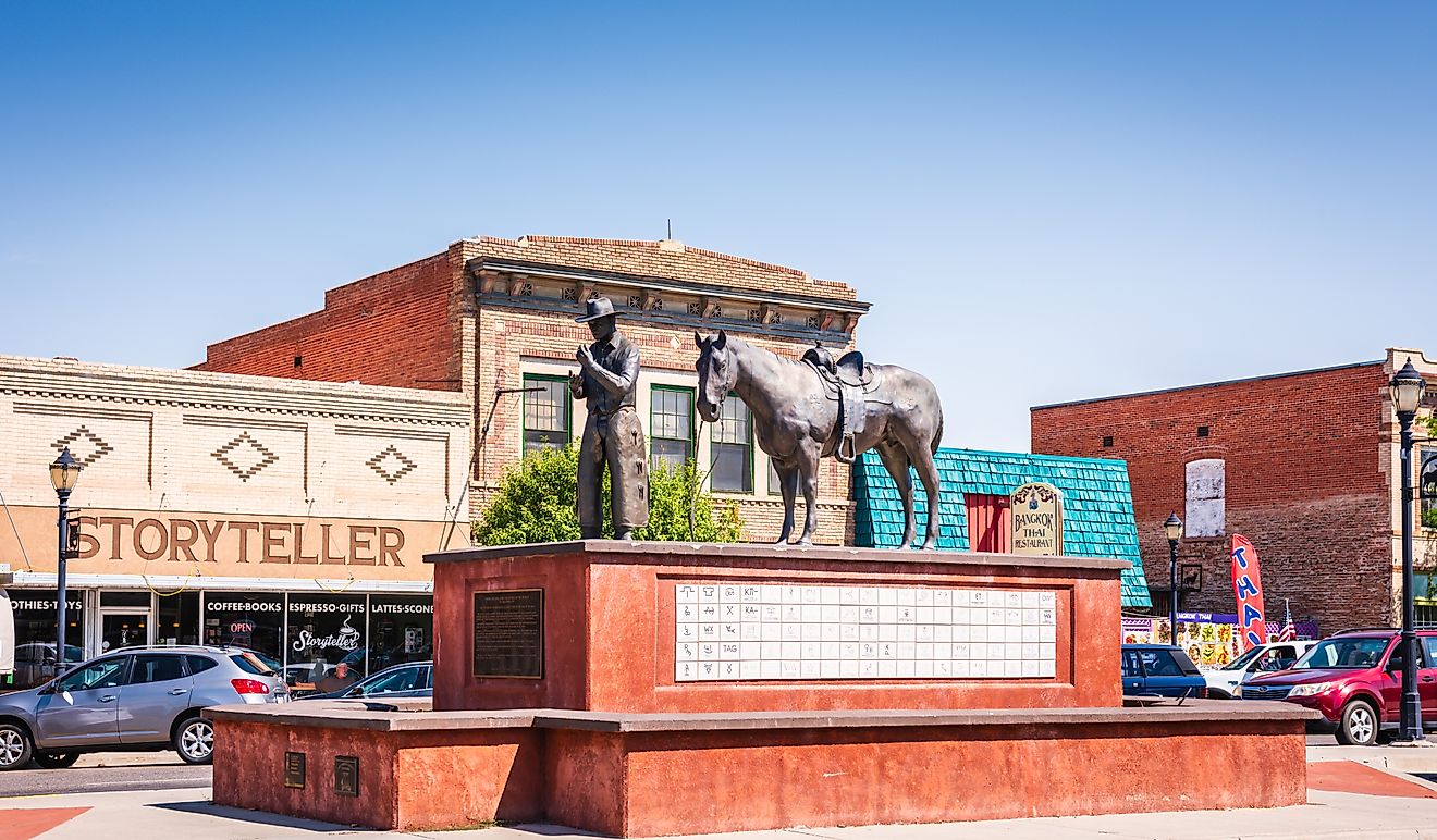 The bronze Soil to Riches statue by Carl Jensen on Broadstreet in Thermopolis, Wyoming. Editorial credit: Sandra Foyt via Shutterstock.com.