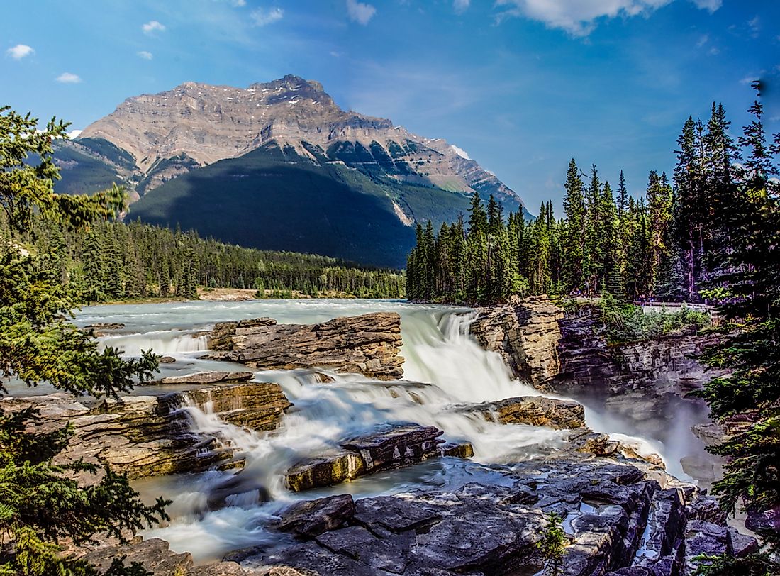 The rapid waters of Athabasca Falls, in Alberta's Jasper National Park, run through the meeting place of the Candian Prairie and the Rocky Mountains.