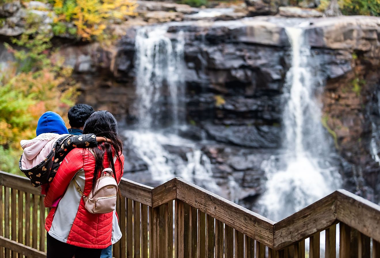 Tourists admiring the beautiful Blackwater Falls in Davis, West Virginia.