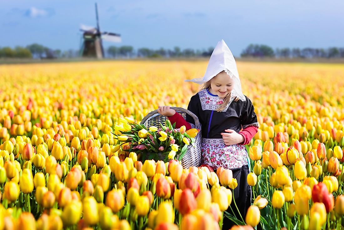 Young girl wearing traditional Dutch clothing.