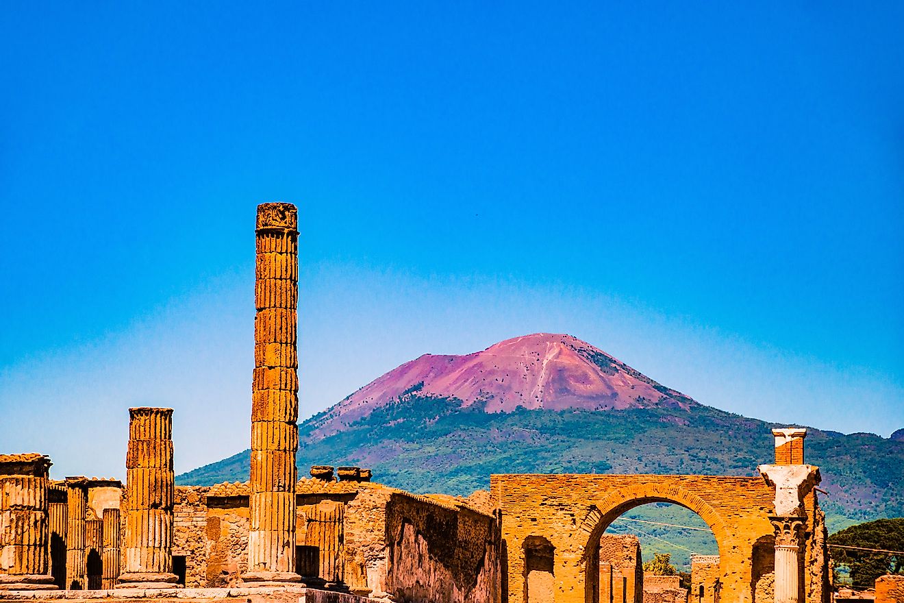 The famous antique site of Pompeii, near Naples. It was completely destroyed by the eruption of Mount Vesuvius (in the background). Image credit: Romas_Photo/Shutterstock.com