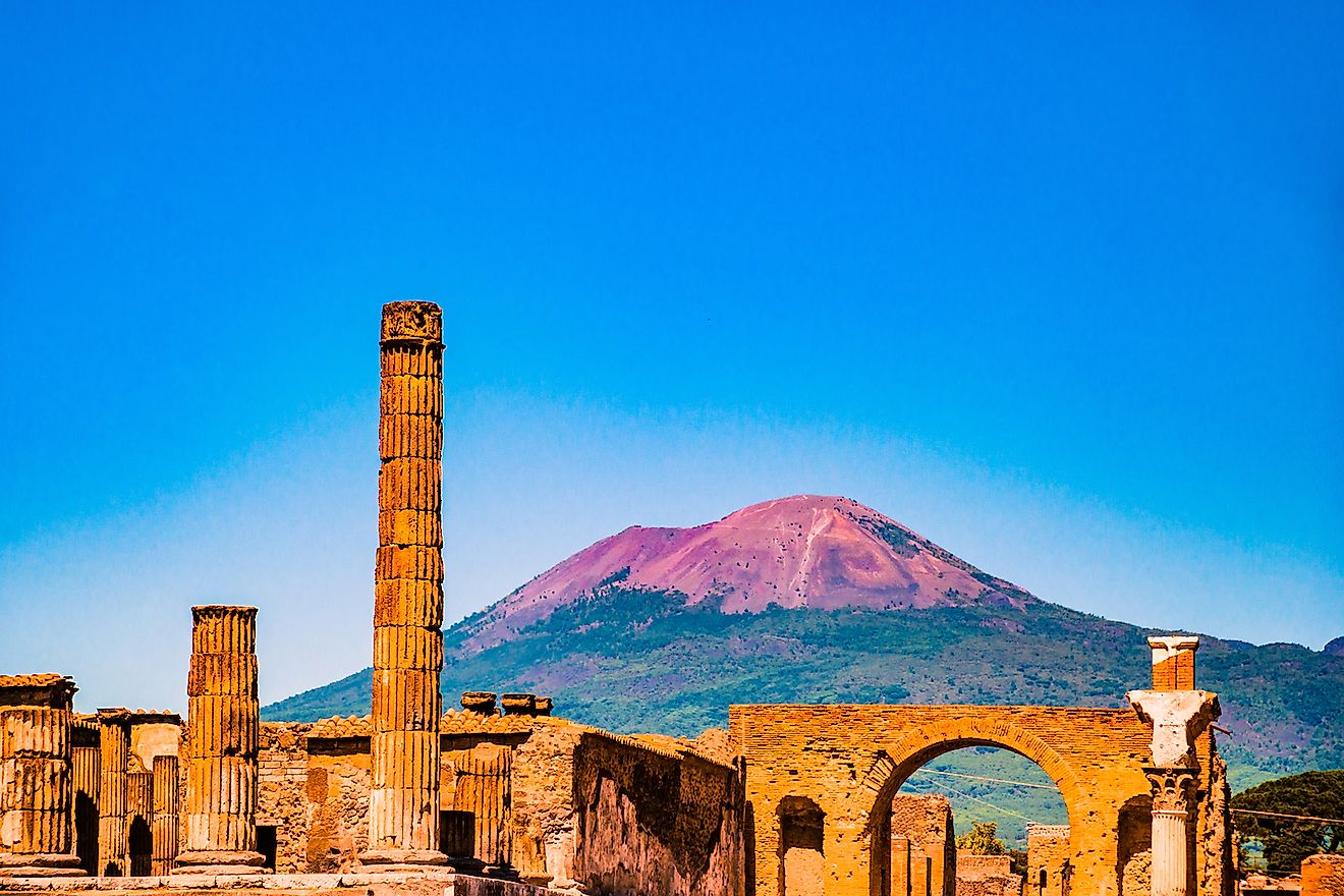 The famous antique site of Pompeii, near Naples. It was completely destroyed by the eruption of Mount Vesuvius (in the background). Image credit: Romas_Photo/Shutterstock.com