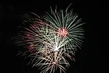 Vibrant fireworks fill the night sky during the 2019 Fourth of July show in Seward, Nebraska. Via Shutterstock / Alex Erwin.