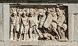 Relief of a battle scene between the Roman legion and Barbarians from Rome. Image credit: Cris Foto / Shutterstock.com