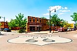 Standing on the corner of Historic Route 66 in Winslow, Arizona. 