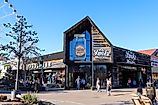 A view of the exterior of the Ole Smoky Tennessee Moonshine at The Island in Pigeon Forge, Tennessee. Editorial credit: robin gentry / Shutterstock.com
