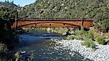 Side view of the bridgeport Covered Bridge at South Yuba River in California, USA. This bridge has the longest clear span of any surviving covered bridge in the world