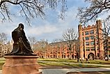 Theodore Dwight Woolsey statue and Phelps Hall on campus of Yale University in New Haven, Connecticut. Image credit: Jay Yuan / Shutterstock.