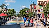 Busy Front Street in downtown with State Street Theater. Traverse City, Michigan. Editorial credit: Heidi Besen / Shutterstock.com