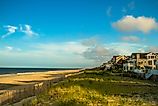 View of waterfront homes and the beach at Bethany Beach, Delaware.