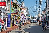Commercial Street in Provincetown, Massachusetts, USA, known for its eclectic range of stores, cafes, and restaurants. Editorial credit: Mystic Stock Photography / Shutterstock.com