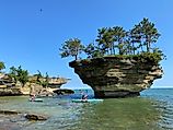 Paddlers reach the iconic Turnip Rock at the top of Michigan’s Thumbcoast. Image Credit: Andrew Douglas