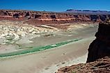 The Colorado River and the dried up arm of Lake Powell at Hite, Utah