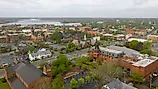 Aerial view of New Bern, North Carolina, with the Neuse River in the distance.