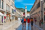 People are strolling through Stradun street in Dubrovnik, Croatia. Image credit: trabantos / Shutterstock.com.