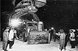 Snow fighting equipment being unloaded from a C-5A at Niagara Falls International Airport